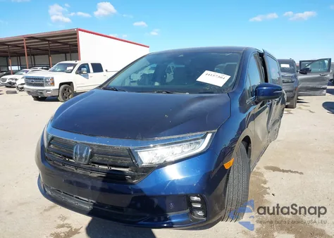 2022 Honda Odyssey Touring z USA, uszkodzony, nr VIN 5FNRL6H81NB001565